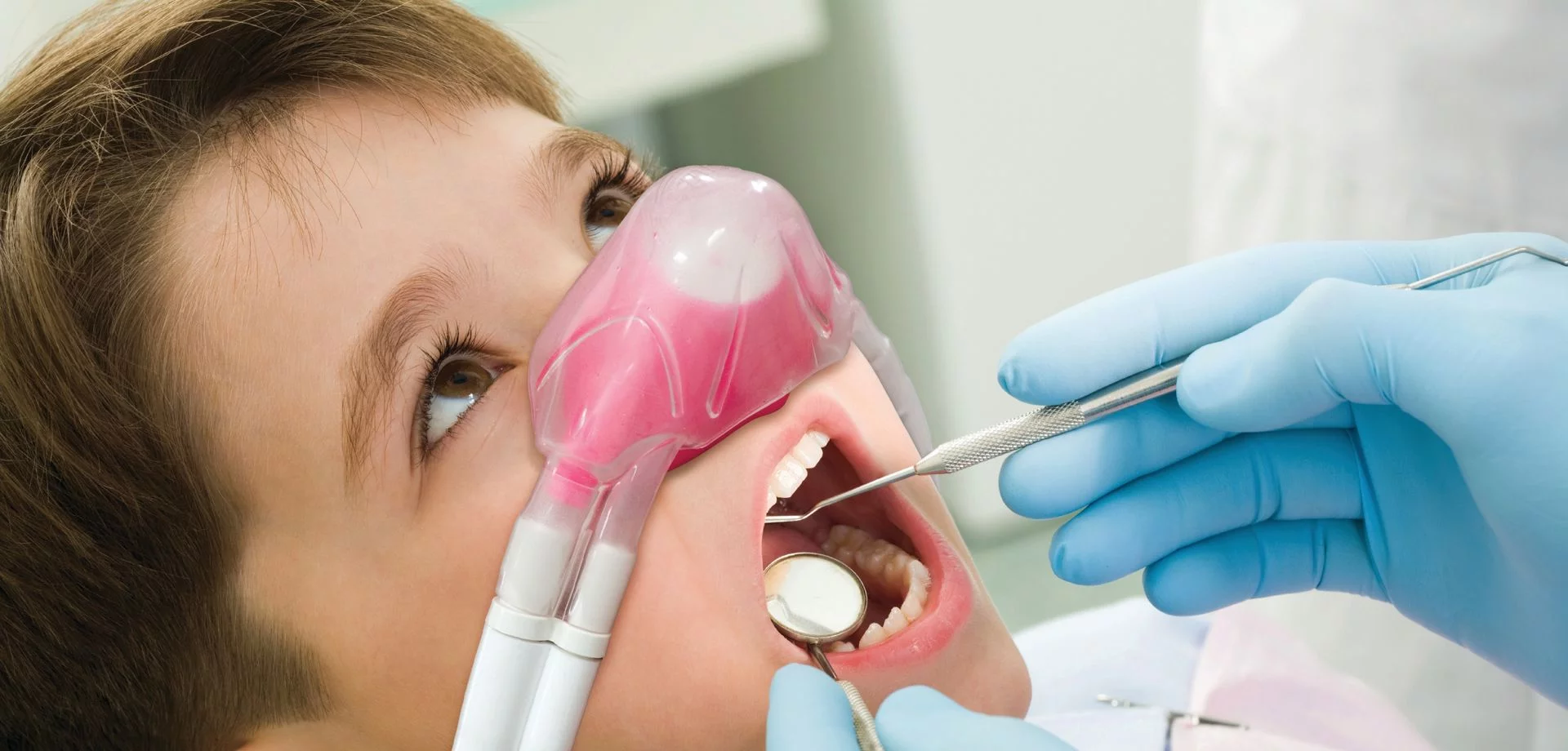 Child receiving nitrous oxide sedation
